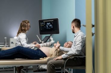 gynecologist-performing-ultrasound-consultation (1)